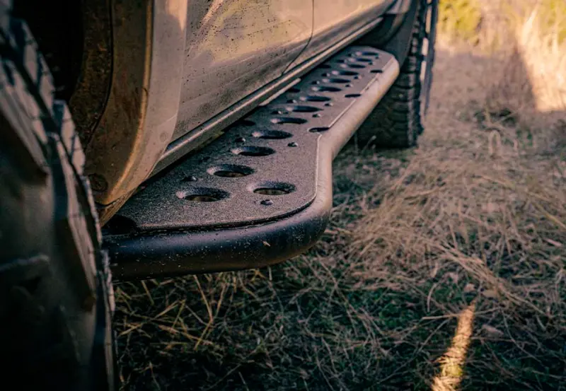 Cali Raised Step-Ed Rock Sliders For 2005–2023 Toyota Tacoma Double Cab Short Bed – Wind-Kick-Out Design W/ Bed Liner Integration 1